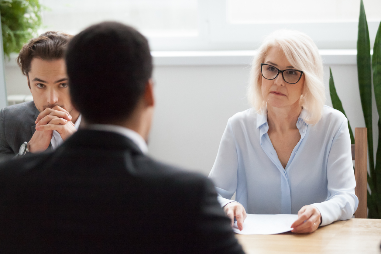 People interviewing a juvenile criminal defense attorney