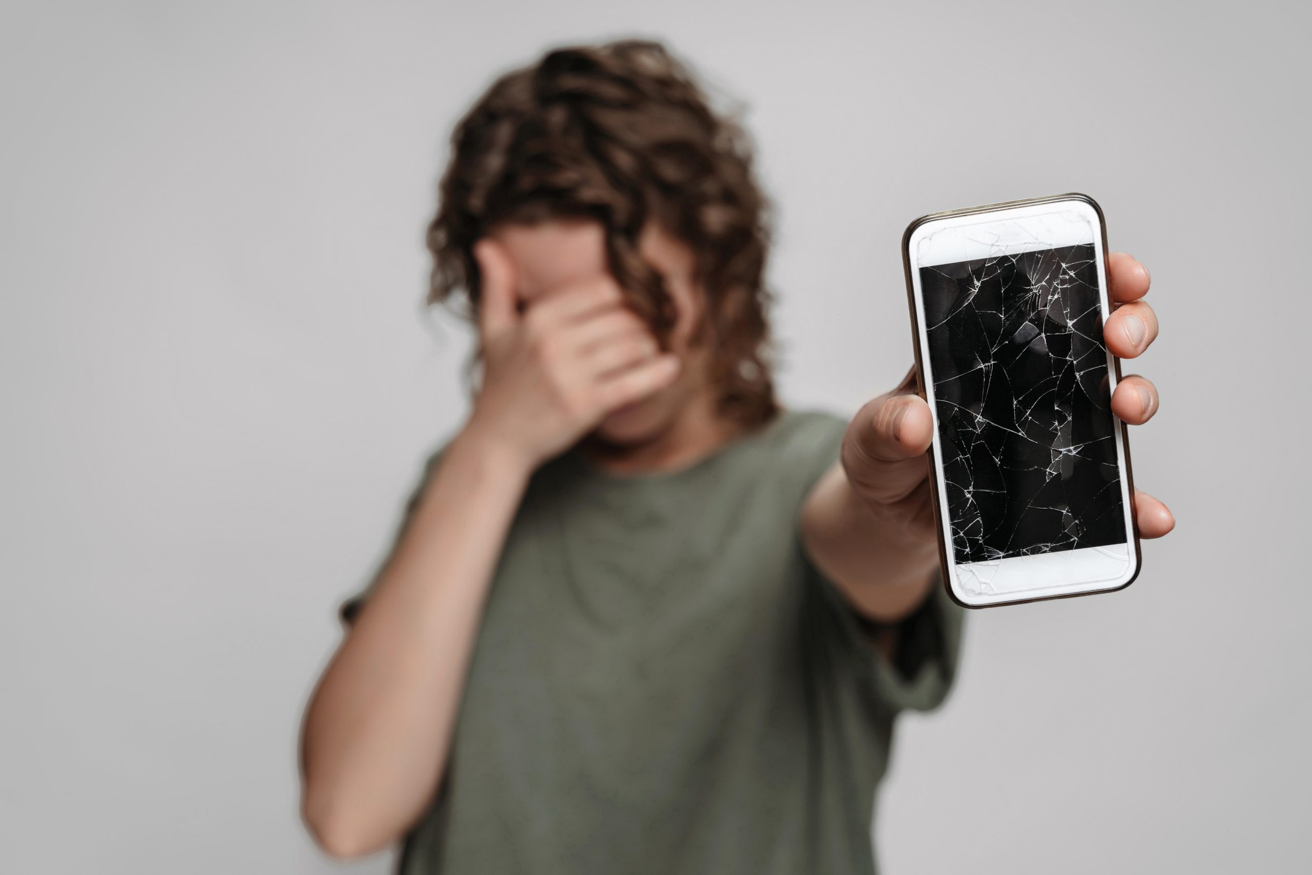 upset-curly-woman-covers-face-with-palm-showing-h-2025-01-09-09-22-31-utc-1-scaled.jpg