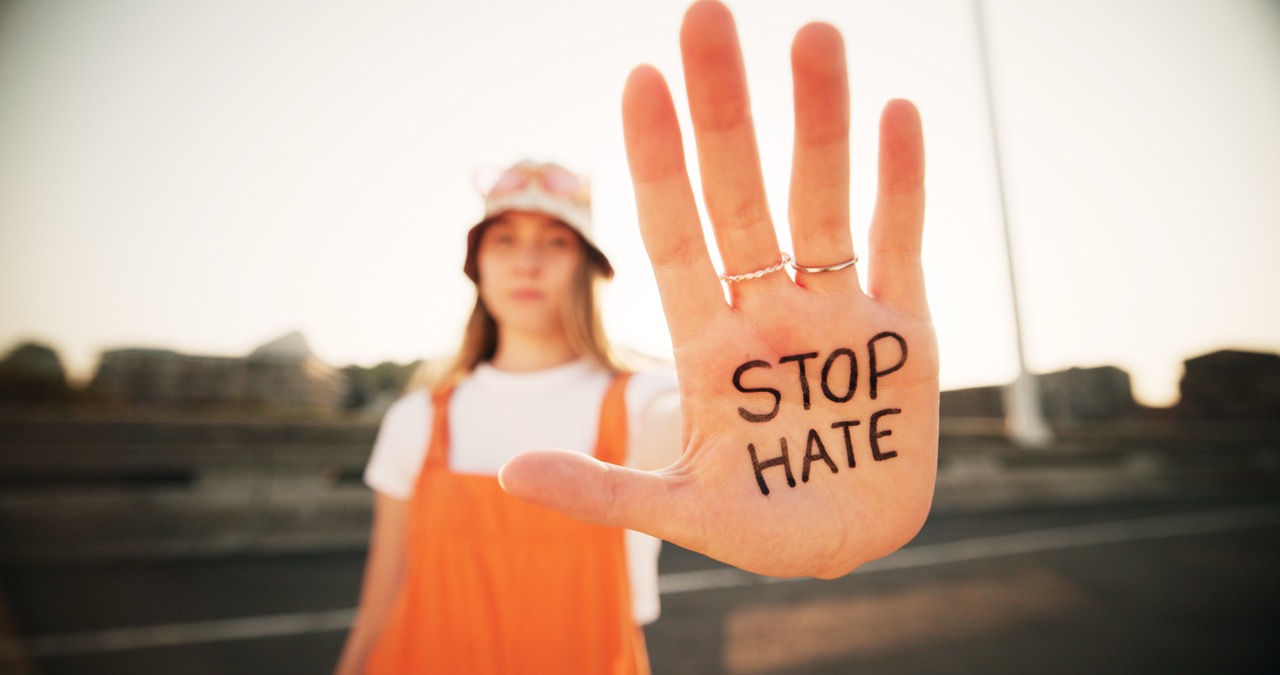 hands-stop-hate-and-equality-for-person-with-writ-2025-04-06-05-46-45-utc.jpg