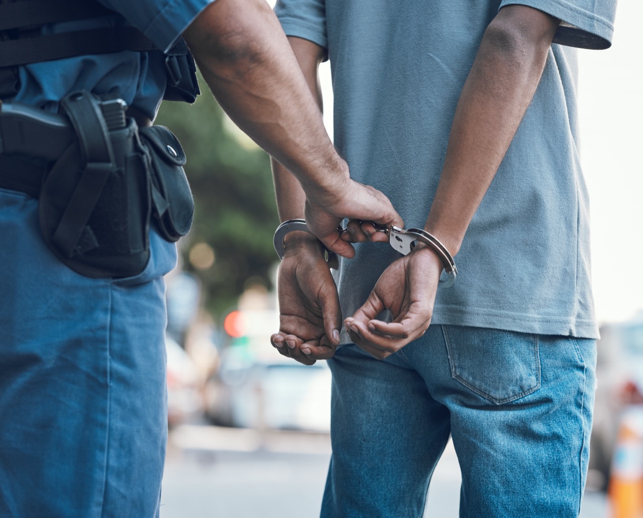 handcuffs-police-and-hands-of-police-man-with-cri-2025-04-06-08-17-44-utc.jpg